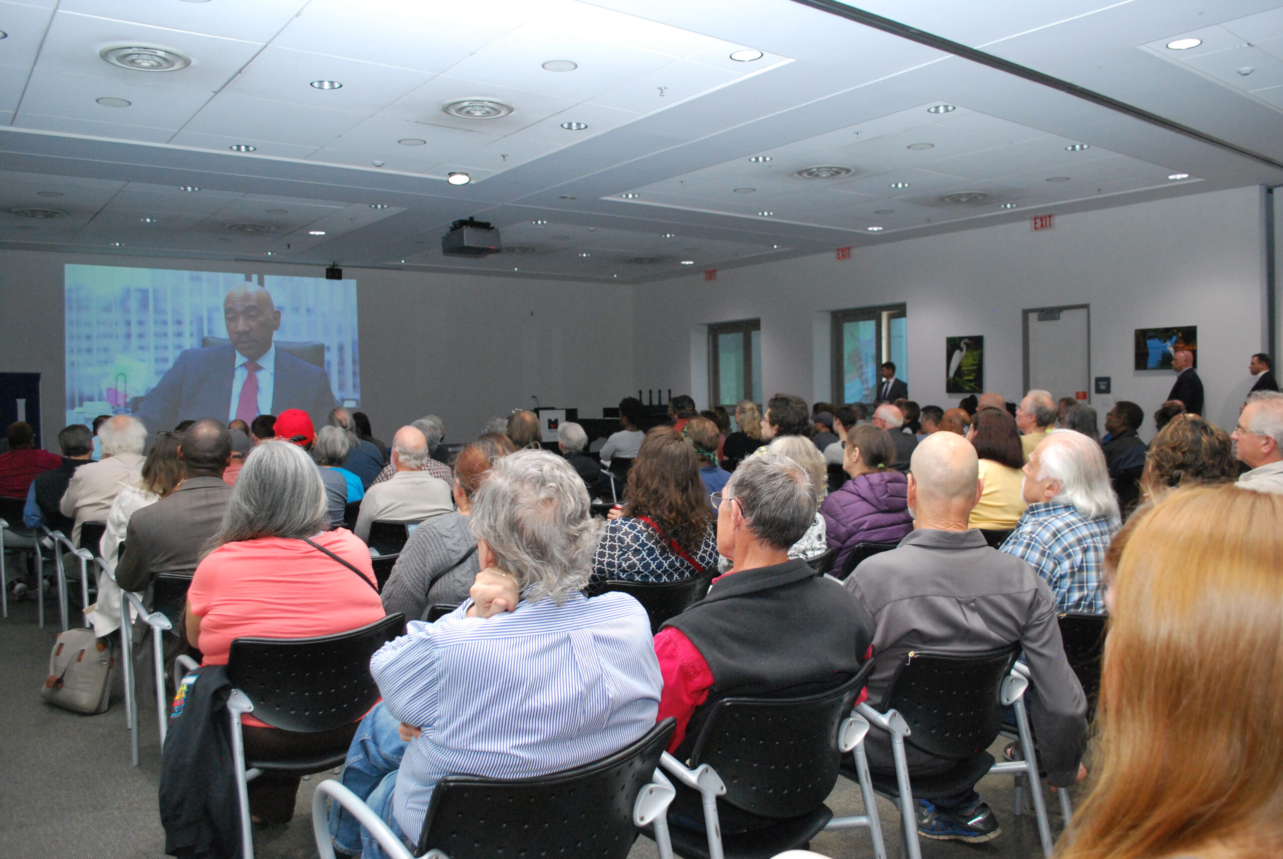 Back Of Room Video Playing Scaled